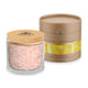 Detox Bath Salts product glass jar filled with Himalayan Crystal Salt stones with salts, cork cover and tan product box with bands of gold and sliced lemons both featuring Himalayan Crystal Salt logo, on white background