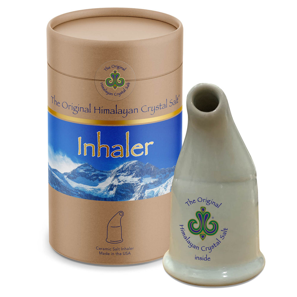 Original Himalayan Crystal Salt Inhaler off-white ceramic inhaler and tan cylindrical box with gold band and snow-capped mountains and blue sky, with white background