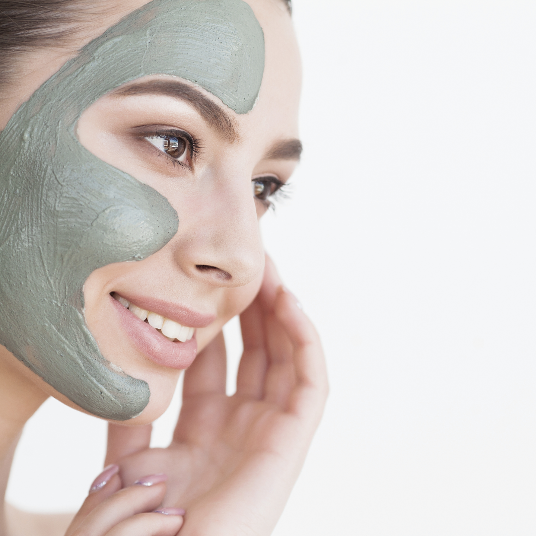 Sole Peloid Mud Mask right-facing profile of white woman with face half covered with mud mask against white background