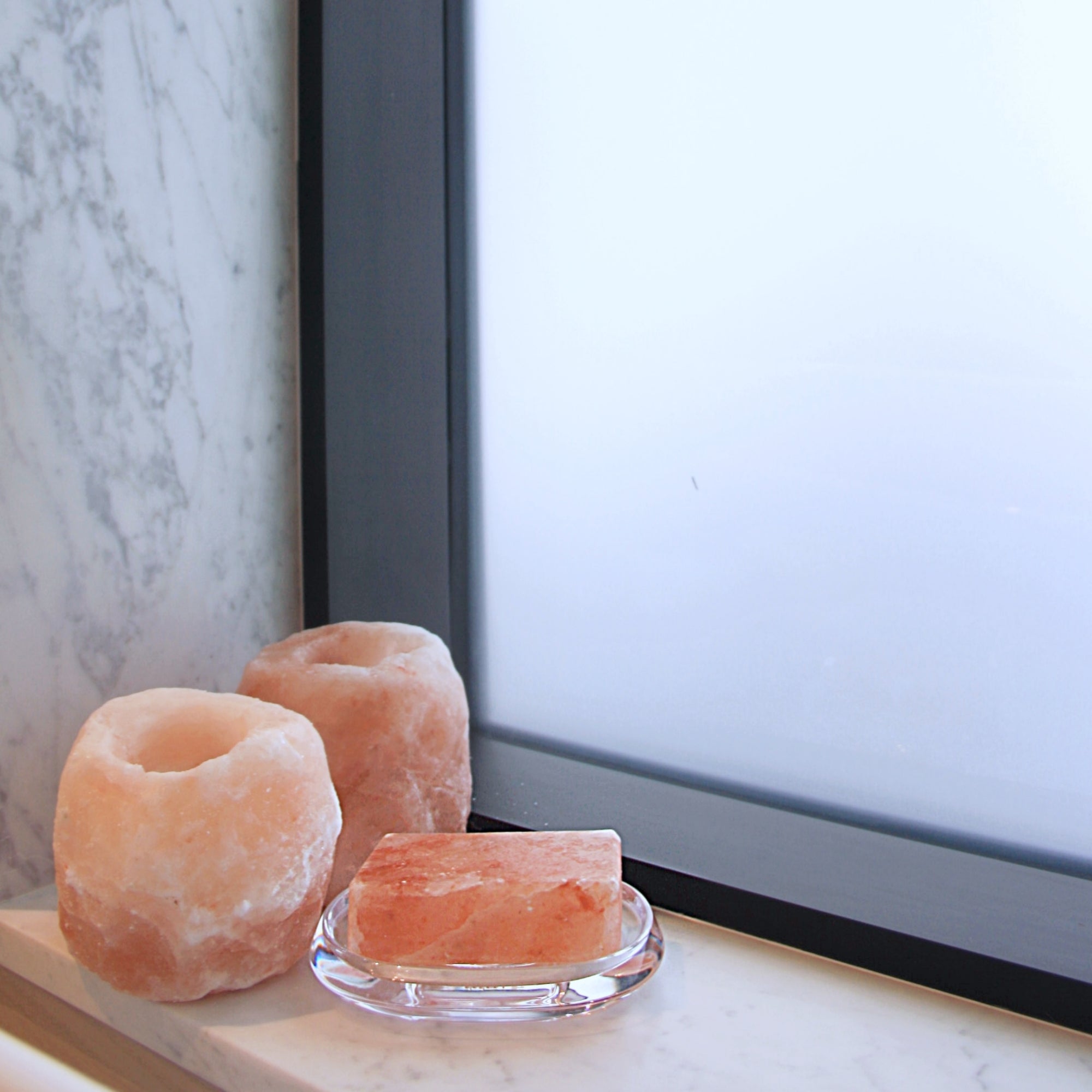 Deo-Bar in soap tray with salt votives on window sill