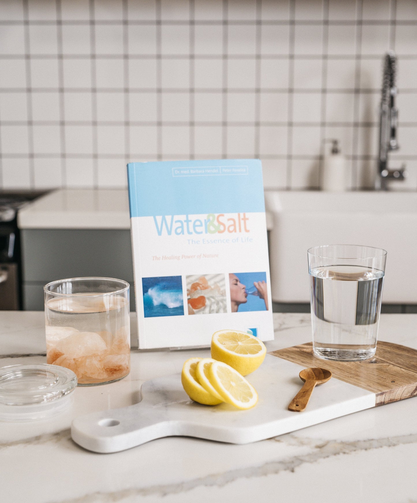 Water & Salt: the Essence of Life" by Dr. Hendel and Peter Ferreira with Sole and lemon water left view
